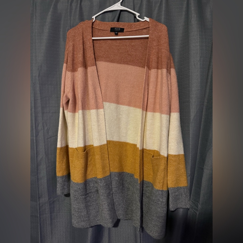 Modern canvas cardigan. Never worn. Smoke free home. Size large.